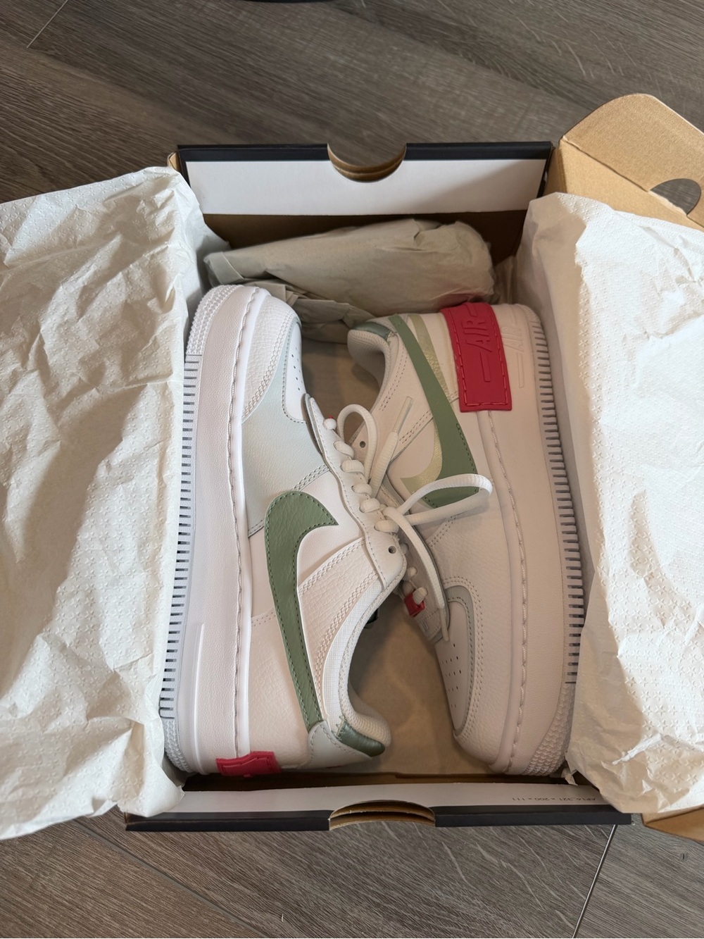 Nike Kids White Sneakers with Sage Green and Pink Accents